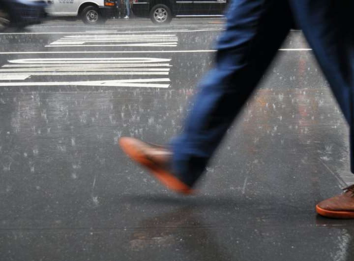 Walk or run in the rain? A physics-based approached to staying dry (or at least drier)