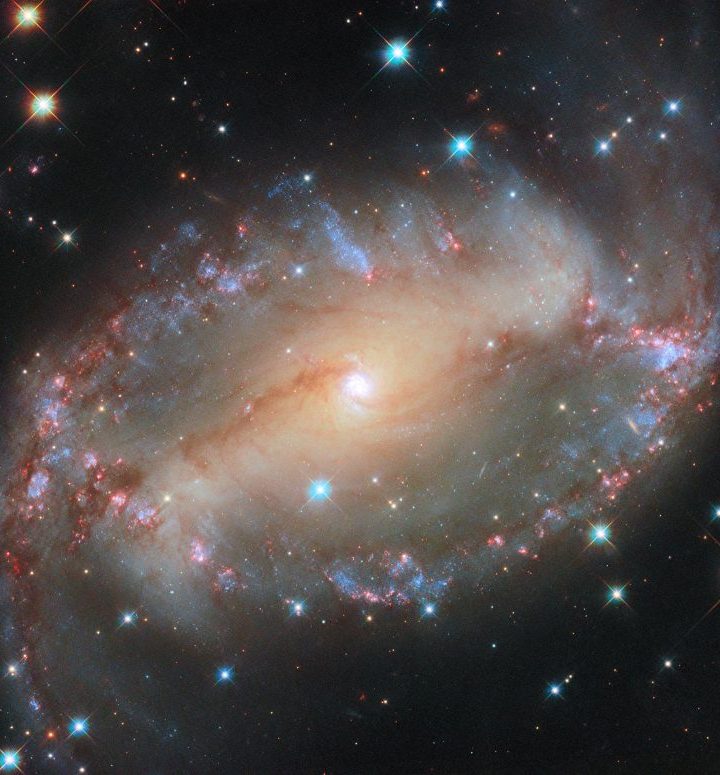 Galactic Gaze: A Cosmic Eye Watching From 76 Million Light-Years Away